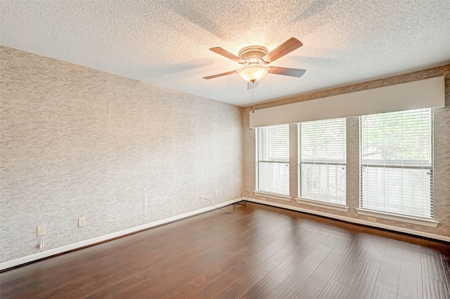 2277 S Kirkwood Rd Unit 906, Houston, TX 77077 - unfurnished room featuring a textured ceiling, a ceiling fan, and dark wood-type flooring