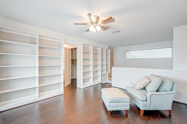 2277 S Kirkwood Rd Unit 906, Houston, TX 77077 - living area with ceiling fan and wood finished floors