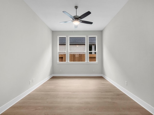 14328 Moonlit Creek Ct, Montgomery, TX 77316 - spare room featuring a ceiling fan and light wood finished floors