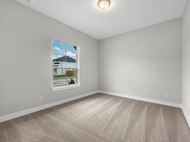 14328 Moonlit Creek Ct, Montgomery, TX 77316 - carpeted empty room featuring baseboards