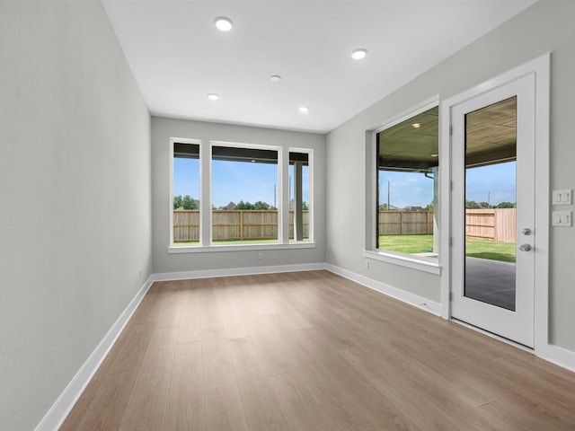 14328 Moonlit Creek Ct, Montgomery, TX 77316 - unfurnished room with wood finished floors and recessed lighting