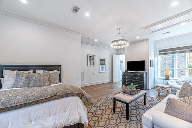 3028 Locke Ln, Houston, TX 77019 - bedroom with ornamental molding, attic access, wood finished floors, and recessed lighting
