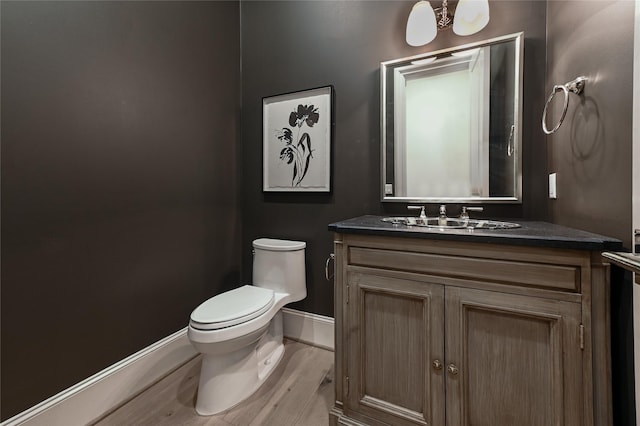 3028 Locke Ln, Houston, TX 77019 - half bath with vanity and wood finished floors