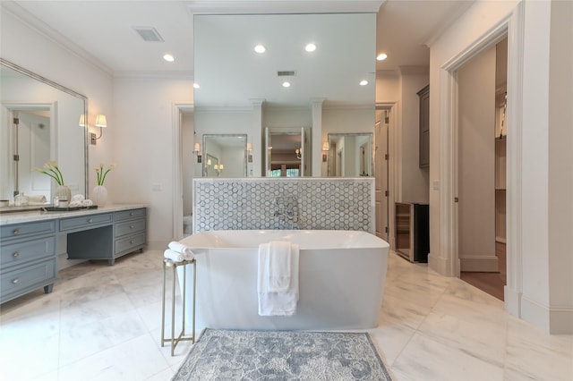 3028 Locke Ln, Houston, TX 77019 - full bath with ornamental molding, a soaking tub, vanity, and recessed lighting