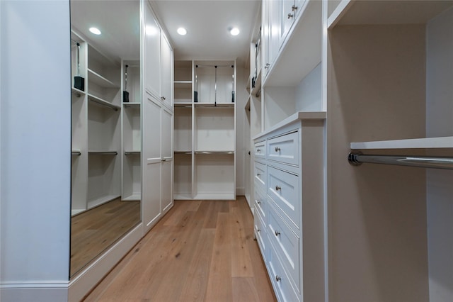 3028 Locke Ln, Houston, TX 77019 - walk in closet with light wood finished floors