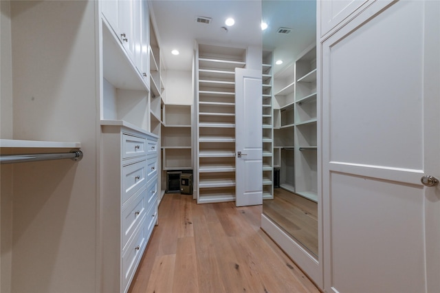 3028 Locke Ln, Houston, TX 77019 - spacious closet with light wood finished floors