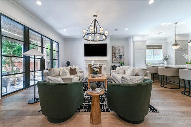 3028 Locke Ln, Houston, TX 77019 - living room with plenty of natural light, a chandelier, crown molding, light wood-type flooring, and recessed lighting