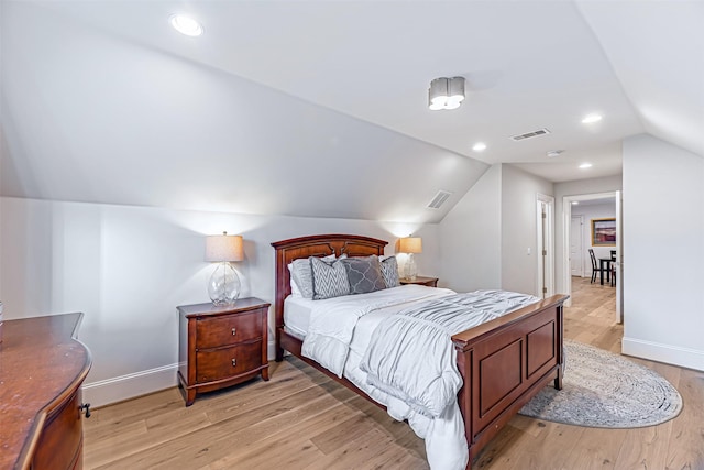 3028 Locke Ln, Houston, TX 77019 - bedroom with vaulted ceiling and light wood finished floors