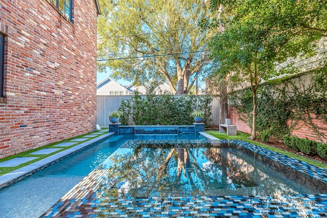 3028 Locke Ln, Houston, TX 77019 - view of swimming pool featuring a fenced backyard