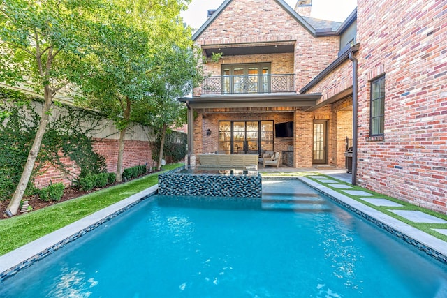 3028 Locke Ln, Houston, TX 77019 - view of pool with an outdoor living space and a fenced backyard