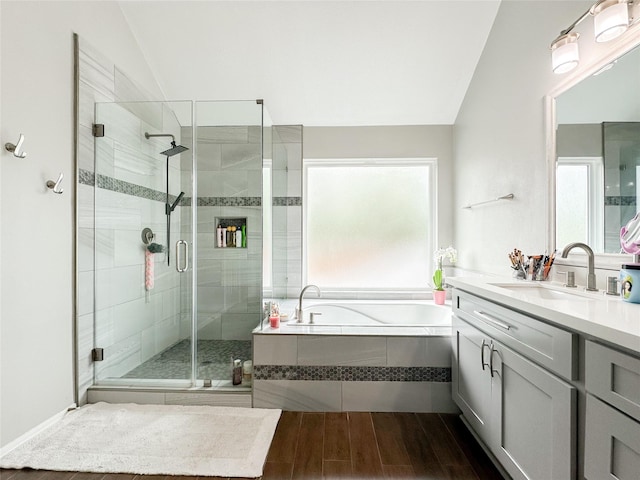 7902 Granite Ridge Ln, Houston, TX 77095 - full bath with a garden tub, vanity, a stall shower, plenty of natural light, and lofted ceiling