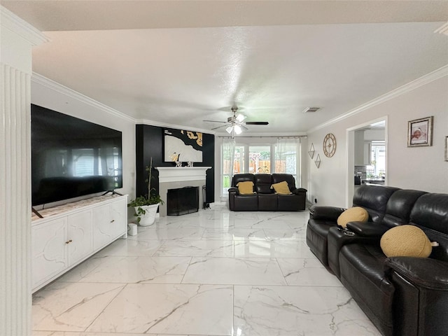 7902 Granite Ridge Ln, Houston, TX 77095 - living area with ceiling fan, crown molding, a fireplace, and light marble finish floors