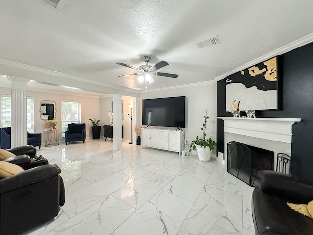 7902 Granite Ridge Ln, Houston, TX 77095 - living room with decorative columns, a ceiling fan, crown molding, a fireplace, and marble finish floors