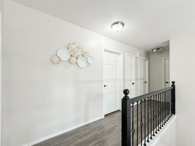 7902 Granite Ridge Ln, Houston, TX 77095 - hall with wood finished floors and an upstairs landing