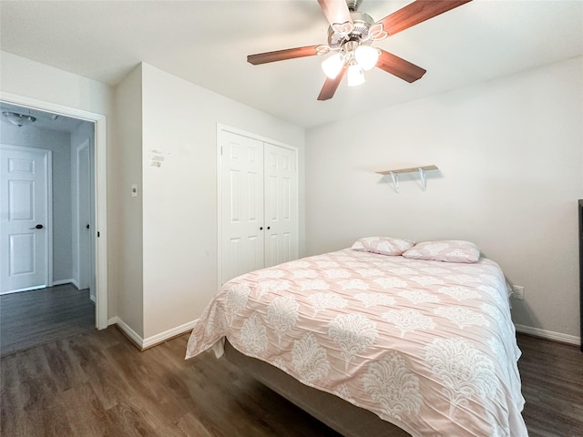 7902 Granite Ridge Ln, Houston, TX 77095 - bedroom featuring wood finished floors, a closet, and ceiling fan
