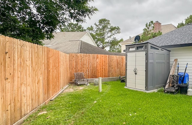 7902 Granite Ridge Ln, Houston, TX 77095 - fenced backyard featuring a storage unit