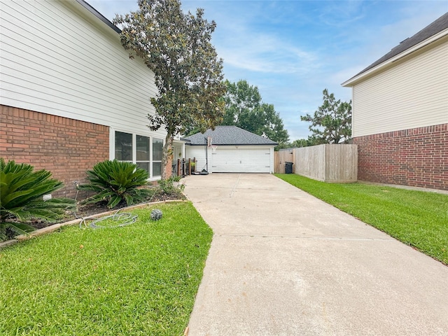 7902 Granite Ridge Ln, Houston, TX 77095 - view of yard with a detached garage