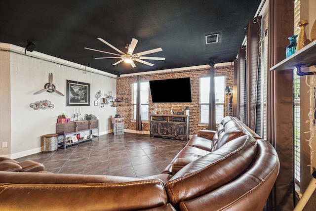 29513 Salem Fields Dr, Spring, TX 77386 - tiled living area featuring brick wall and ceiling fan