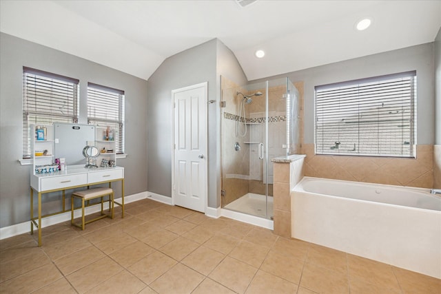 29513 Salem Fields Dr, Spring, TX 77386 - bathroom with vaulted ceiling, a garden tub, tile patterned flooring, a stall shower, and recessed lighting