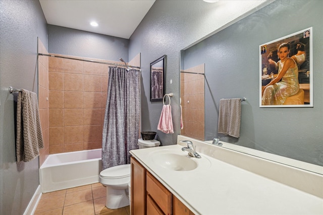 29513 Salem Fields Dr, Spring, TX 77386 - full bath featuring a textured wall, tile patterned flooring, vanity, and shower / tub combo with curtain