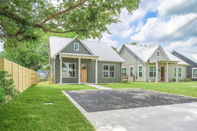 741 Pecan St, New Ulm, TX 78950 - view of front of house with board and batten siding