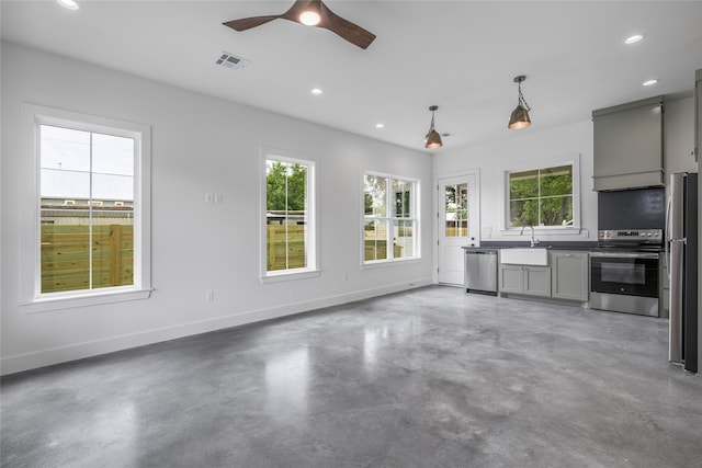 741 Pecan St, New Ulm, TX 78950 - unfurnished living room with finished concrete flooring, recessed lighting, and a ceiling fan