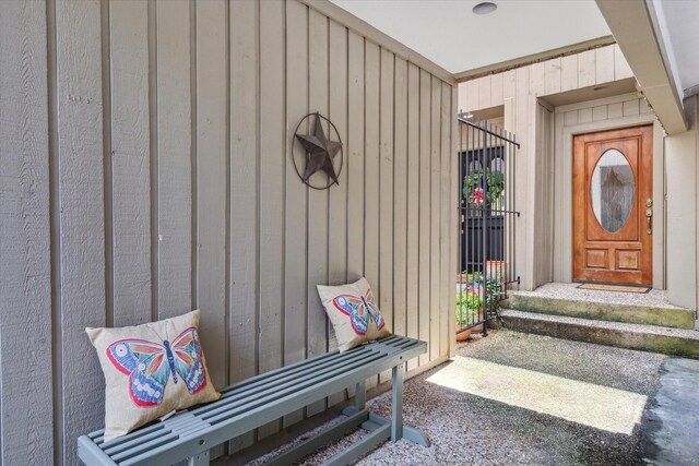 9400 Doliver Dr Unit 30, Houston, TX 77063 - doorway to property with board and batten siding