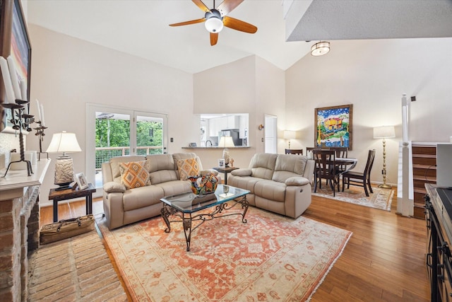 9400 Doliver Dr Unit 30, Houston, TX 77063 - living room with high vaulted ceiling, a ceiling fan, and wood finished floors