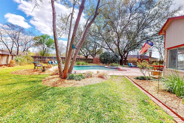 3114 Whetrock Ln, Sugar Land, TX 77479 - fenced backyard with a patio and an in-ground hot tub