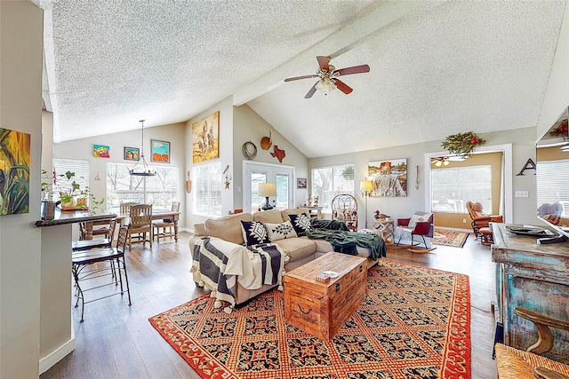 3114 Whetrock Ln, Sugar Land, TX 77479 - living area featuring ceiling fan, a textured ceiling, wood finished floors, and high vaulted ceiling