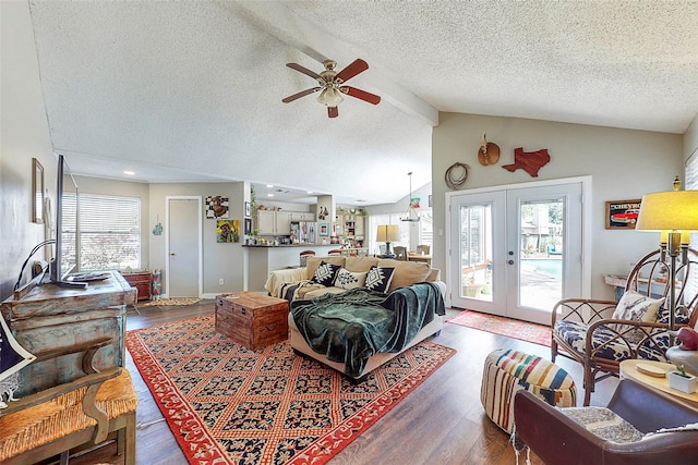 3114 Whetrock Ln, Sugar Land, TX 77479 - living area with a ceiling fan, french doors, a textured ceiling, wood finished floors, and beam ceiling