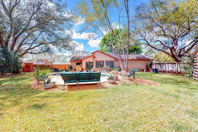3114 Whetrock Ln, Sugar Land, TX 77479 - fenced backyard featuring an outdoor living space and a patio area