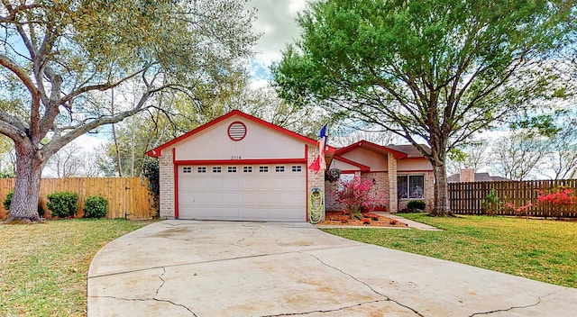 3114 Whetrock Ln, Sugar Land, TX 77479 - ranch-style house with brick siding, an attached garage, and concrete driveway