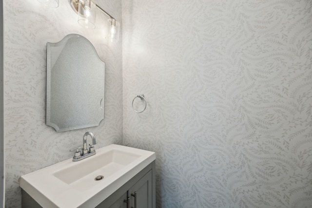 2014 Spillers Ln, Houston, TX 77043 - bathroom featuring vanity and wallpapered walls