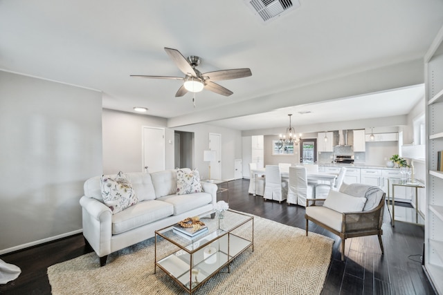 2014 Spillers Ln, Houston, TX 77043 - living area with a chandelier, ceiling fan, and dark wood-type flooring