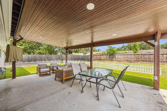 2014 Spillers Ln, Houston, TX 77043 - fenced backyard with a patio area, outdoor dining space, and outdoor lounge area