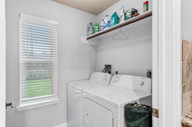 16439 Willingham Way, Houston, TX 77095 - washroom with washing machine and clothes dryer and baseboards