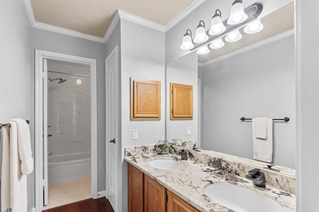 16439 Willingham Way, Houston, TX 77095 - bathroom featuring double vanity,  shower combination, crown molding, and wood finished floors