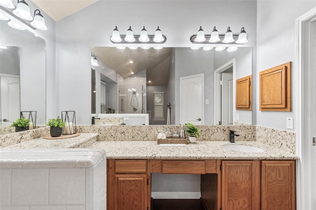 16439 Willingham Way, Houston, TX 77095 - bathroom featuring lofted ceiling, a stall shower, and double vanity