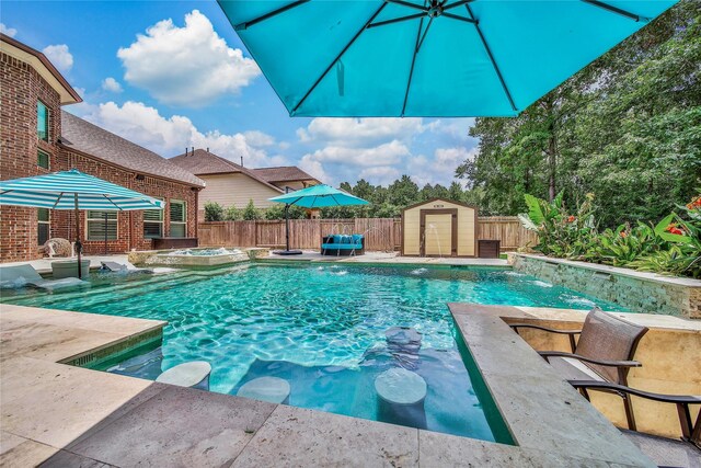 145 Bronze Bow Dr, Montgomery, TX 77316 - view of pool with a shed, a fenced backyard, and an in-ground hot tub