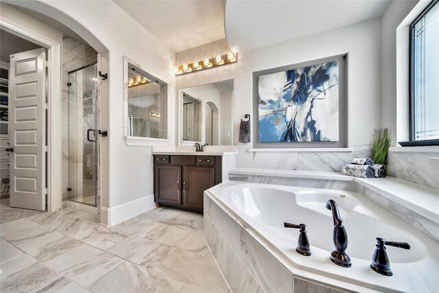 145 Bronze Bow Dr, Montgomery, TX 77316 - bathroom featuring vanity, a garden tub, and a shower stall