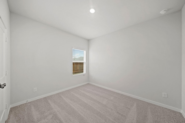 25017 Pomegranate Pl, Montgomery, TX 77316 - carpeted empty room with a smoke detector and baseboards