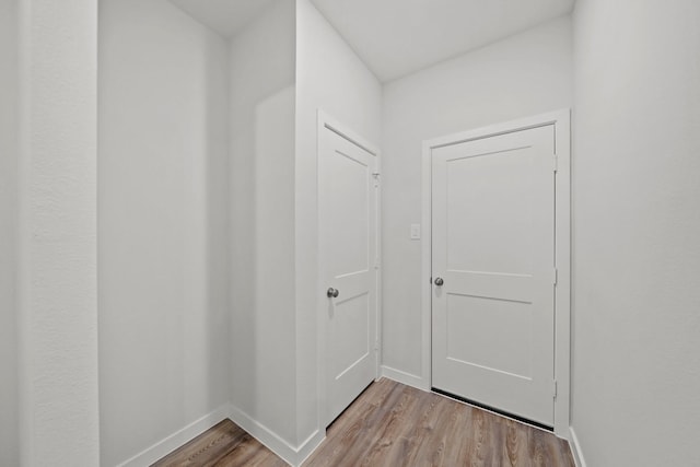 25017 Pomegranate Pl, Montgomery, TX 77316 - hallway with wood finished floors and baseboards