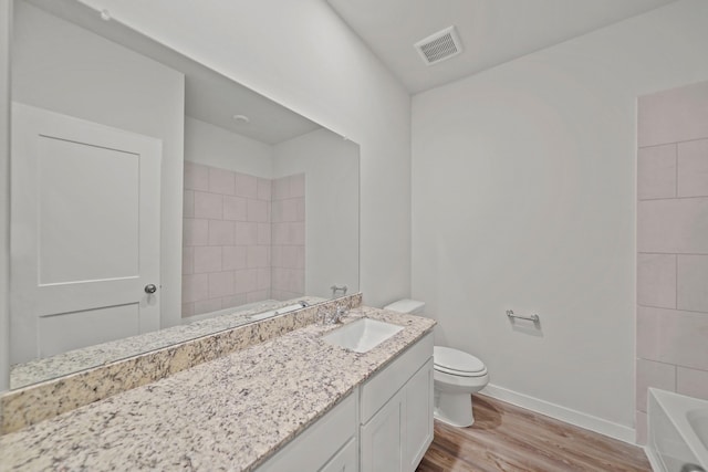25017 Pomegranate Pl, Montgomery, TX 77316 - bathroom featuring wood finished floors, vanity, a tub, and a shower