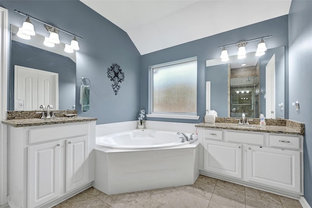 6318 Crystal Forest Trl, Katy, TX 77493 - bathroom with a stall shower, vaulted ceiling, a bath, and two vanities