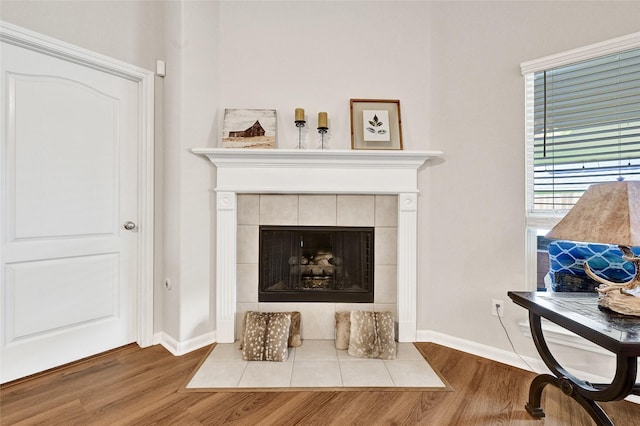 6318 Crystal Forest Trl, Katy, TX 77493 - detailed view of wood finished floors and a tiled fireplace