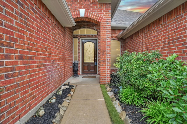 6318 Crystal Forest Trl, Katy, TX 77493 - doorway to property with brick siding and roof with shingles