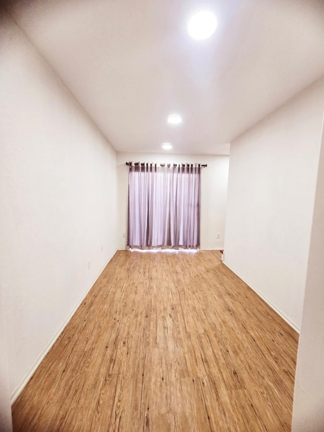 7837 Leonora St, Houston, TX 77061 - unfurnished room featuring wood finished floors and baseboards