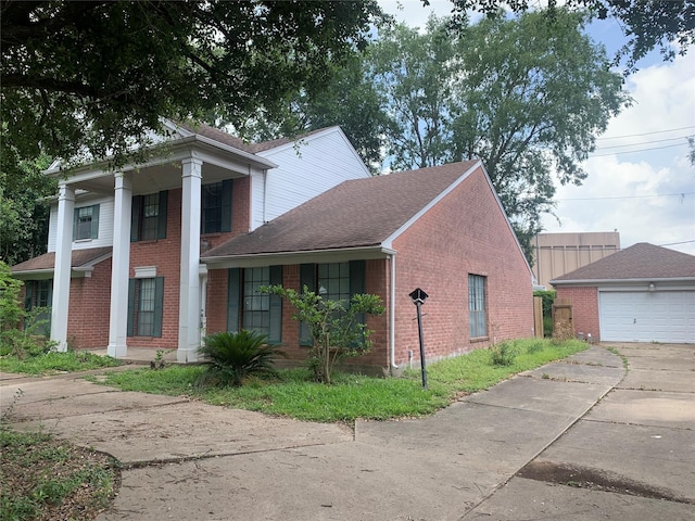 3027 Country Club Blvd, Sugar Land, TX 77478 - view of property exterior with brick siding, covered porch, roof with shingles, and concrete driveway
