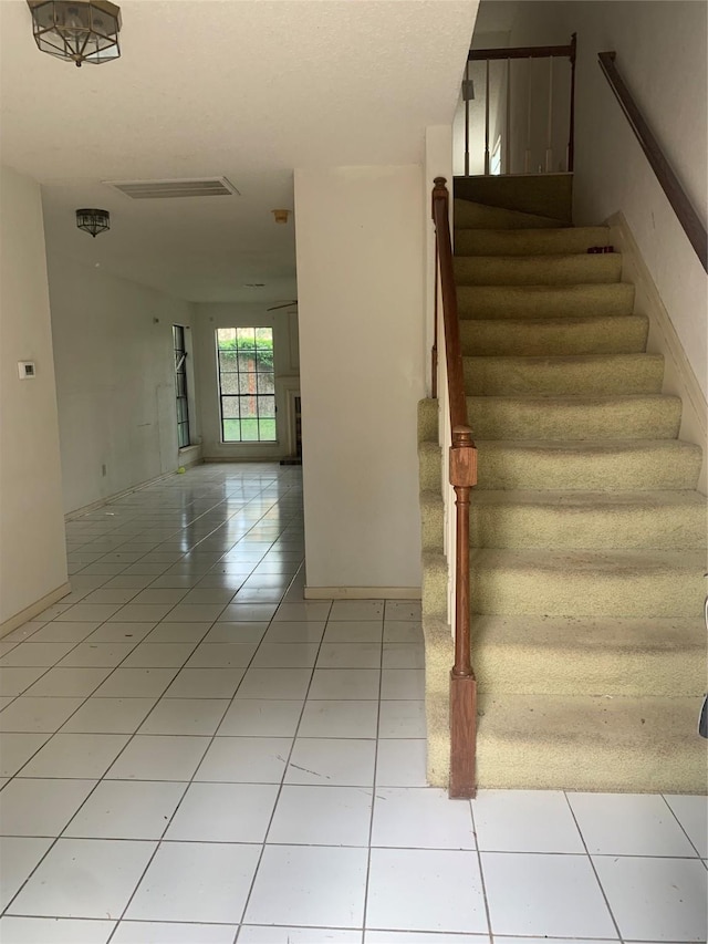 3027 Country Club Blvd, Sugar Land, TX 77478 - staircase with tile patterned flooring